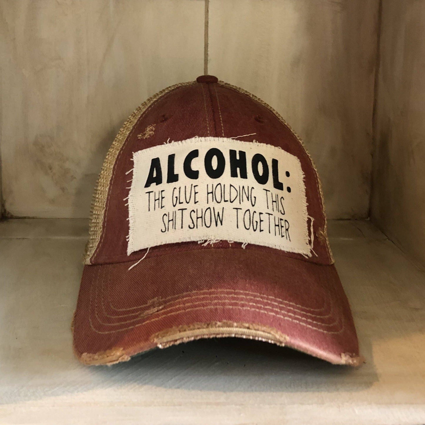 Yellowstone Trucker Hat Series: “Alcohol The Glue Holding This Shit Show Together