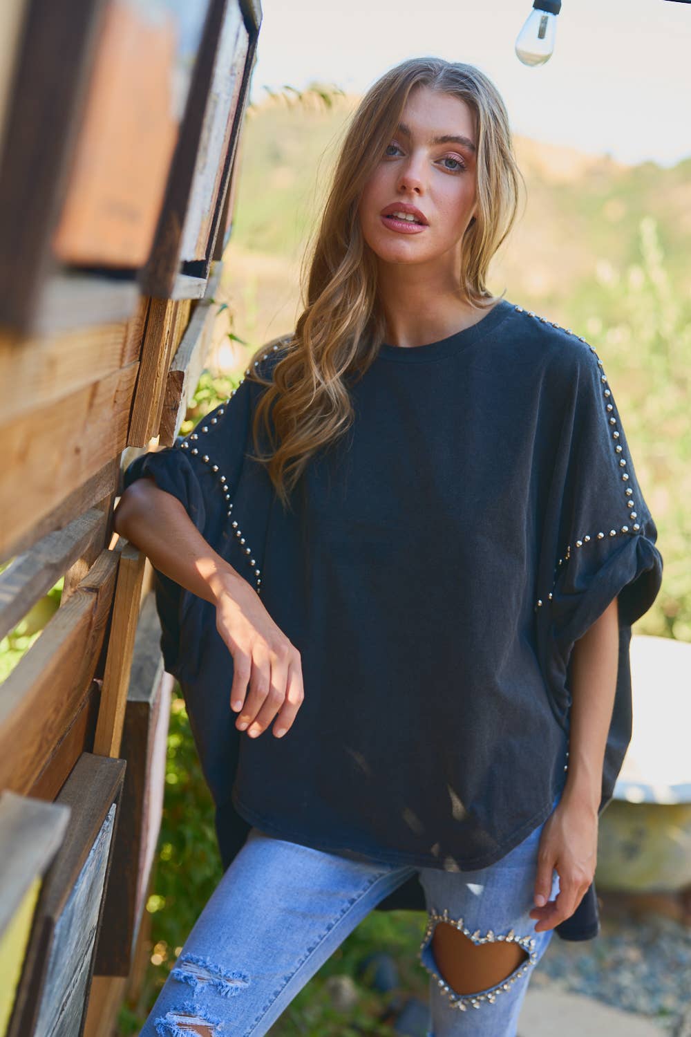 Simply Irresistible, Be the showstopper:  Roll-Up Sleeve Studded High Low Tee